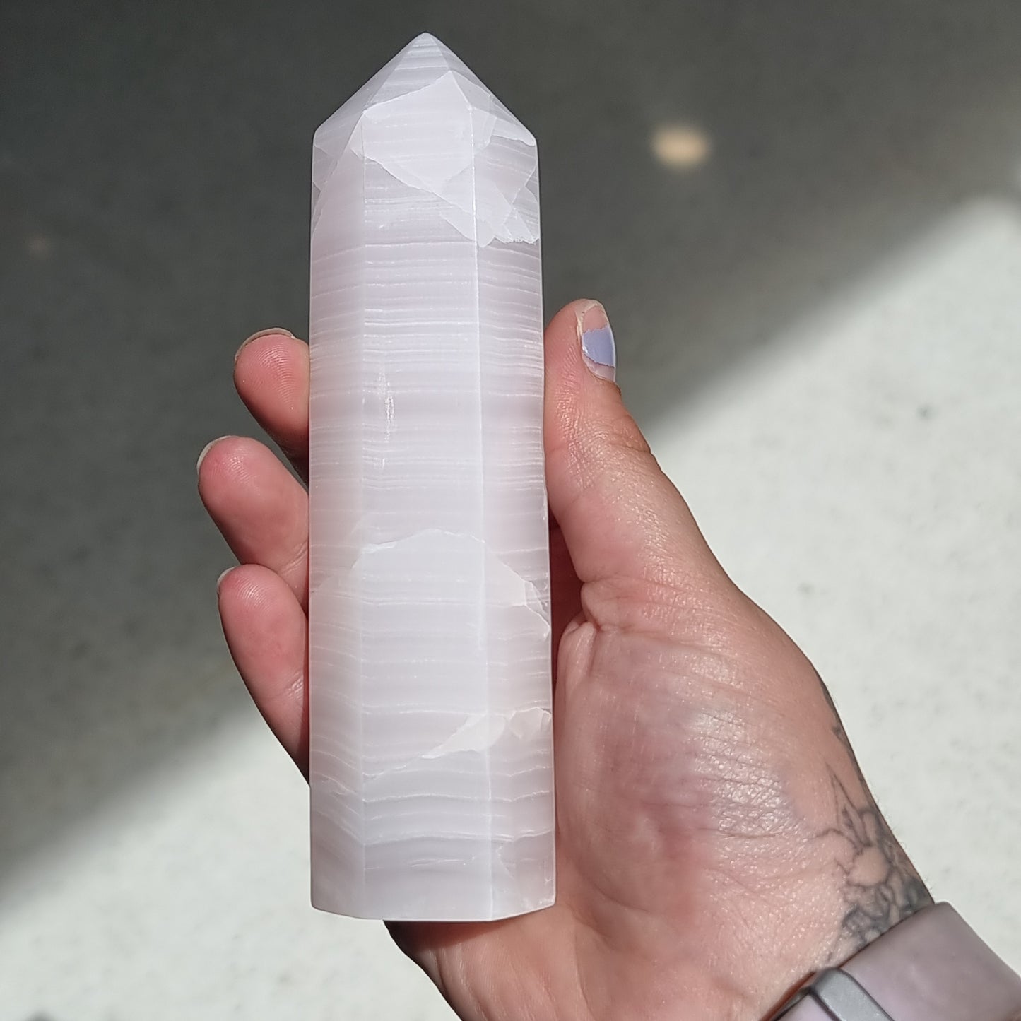 Mangano calcite point - Rivendell Shop