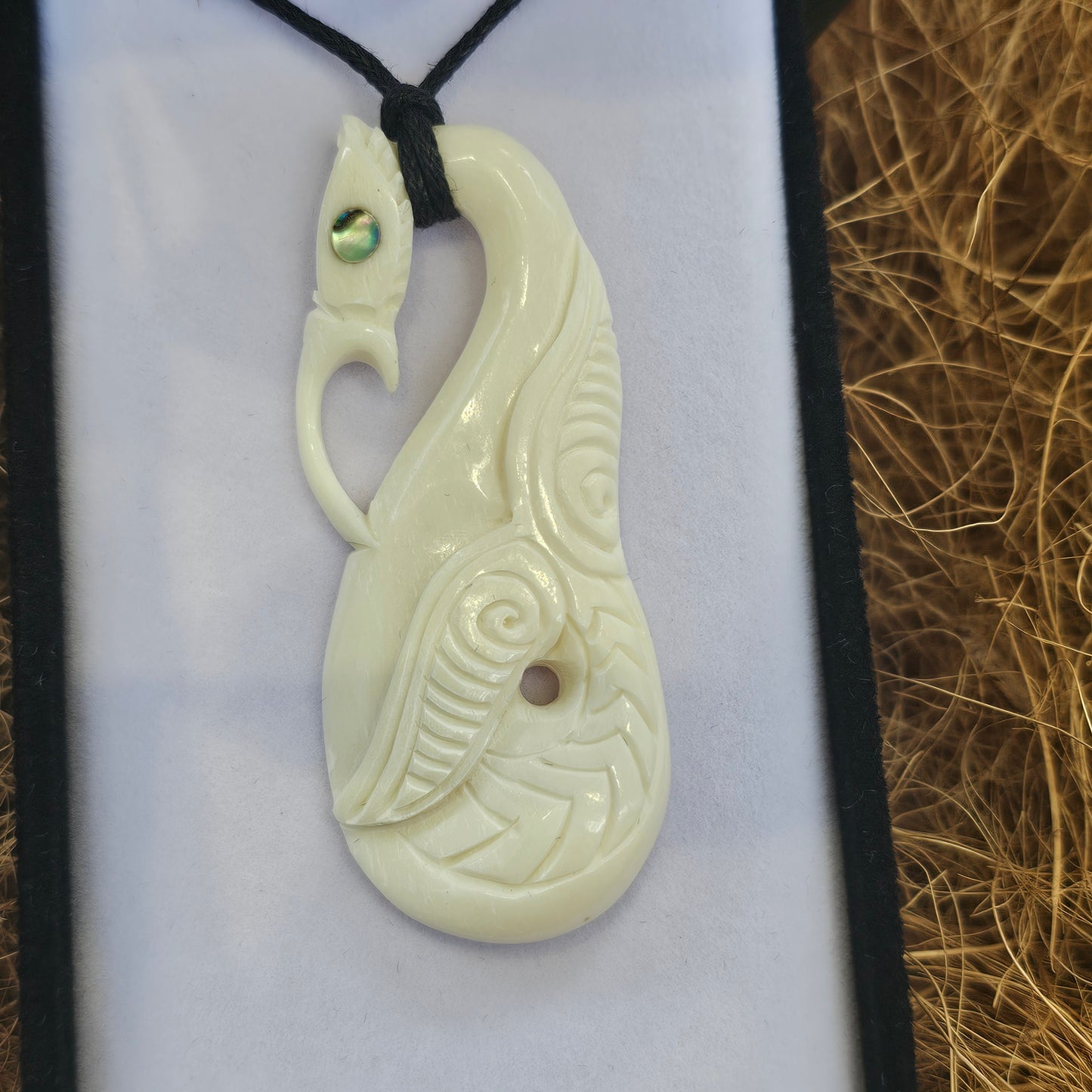 Manaia bone carving