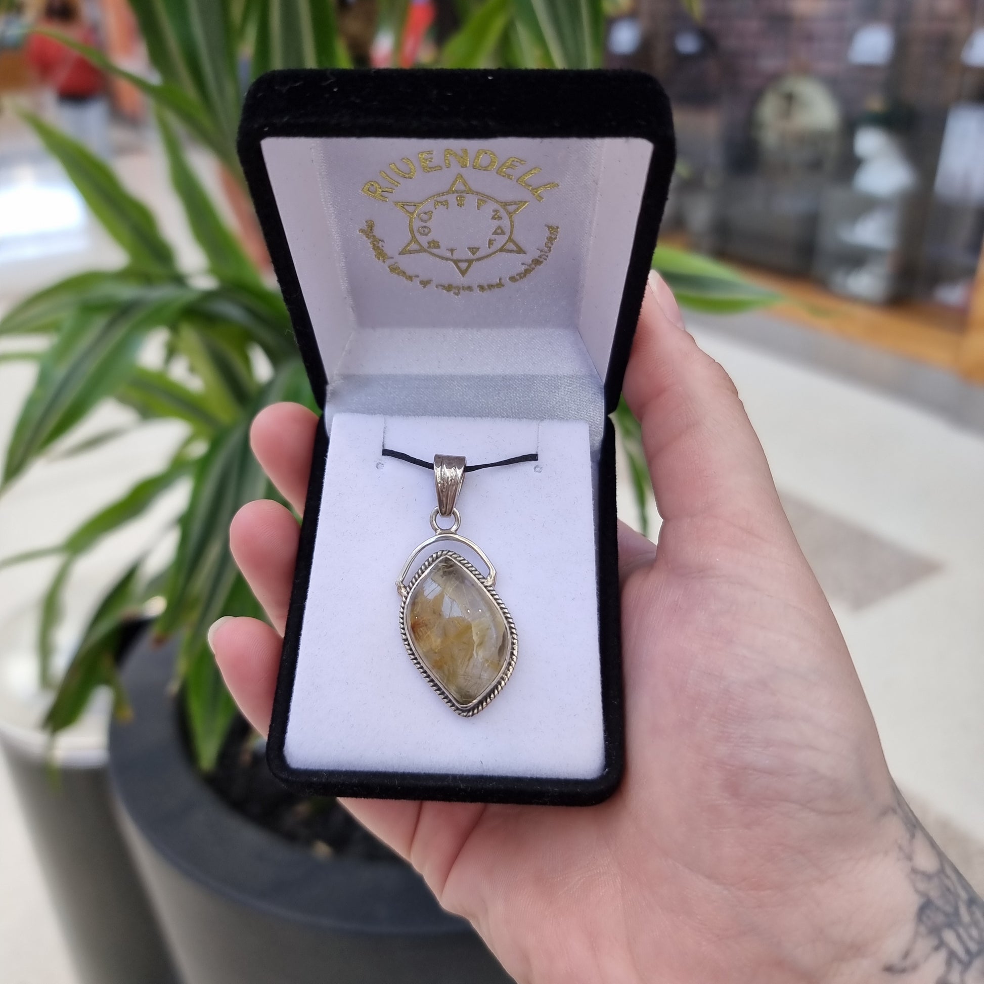 Rutilated quartz pendant - Rivendell Shop