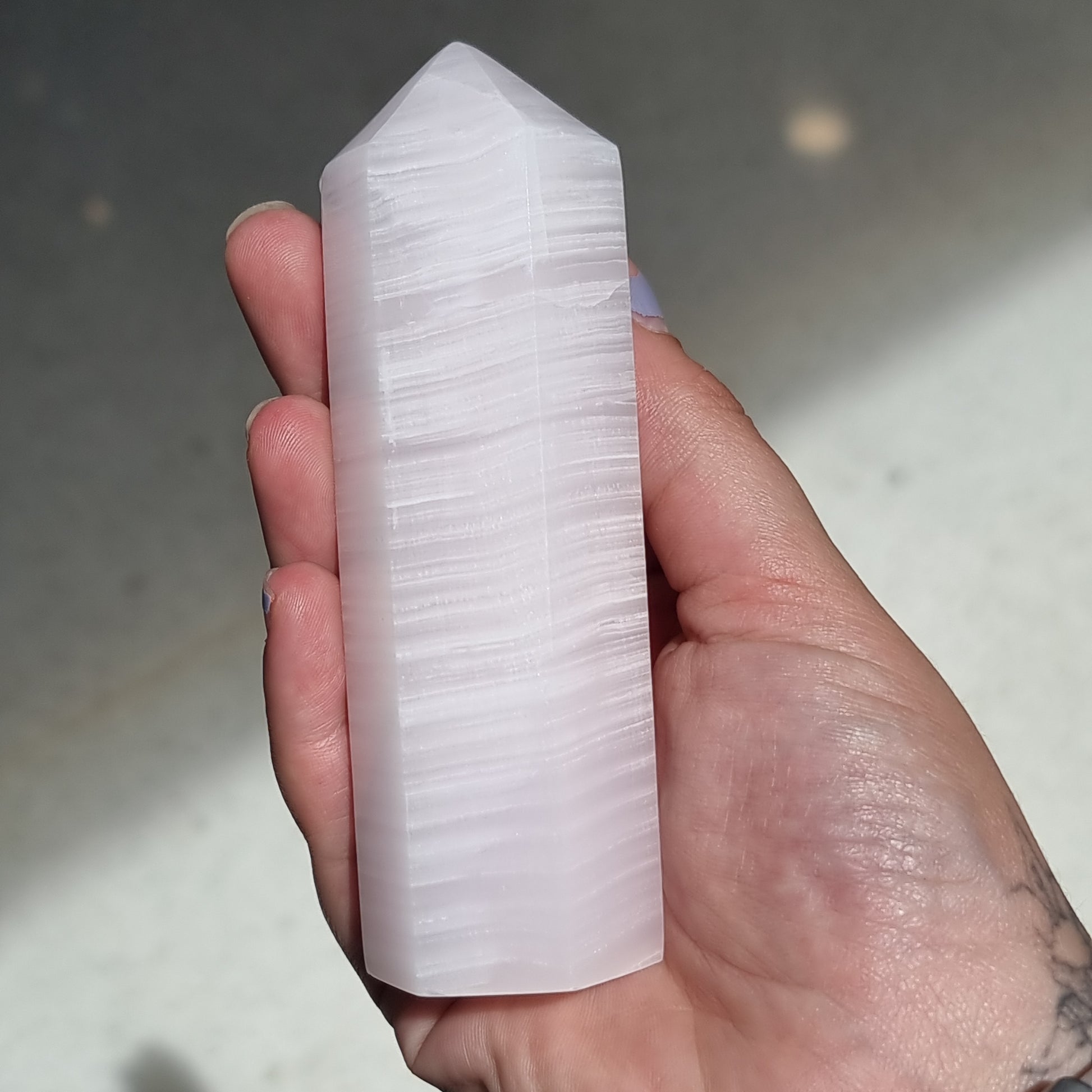 Mangano calcite point - Rivendell Shop