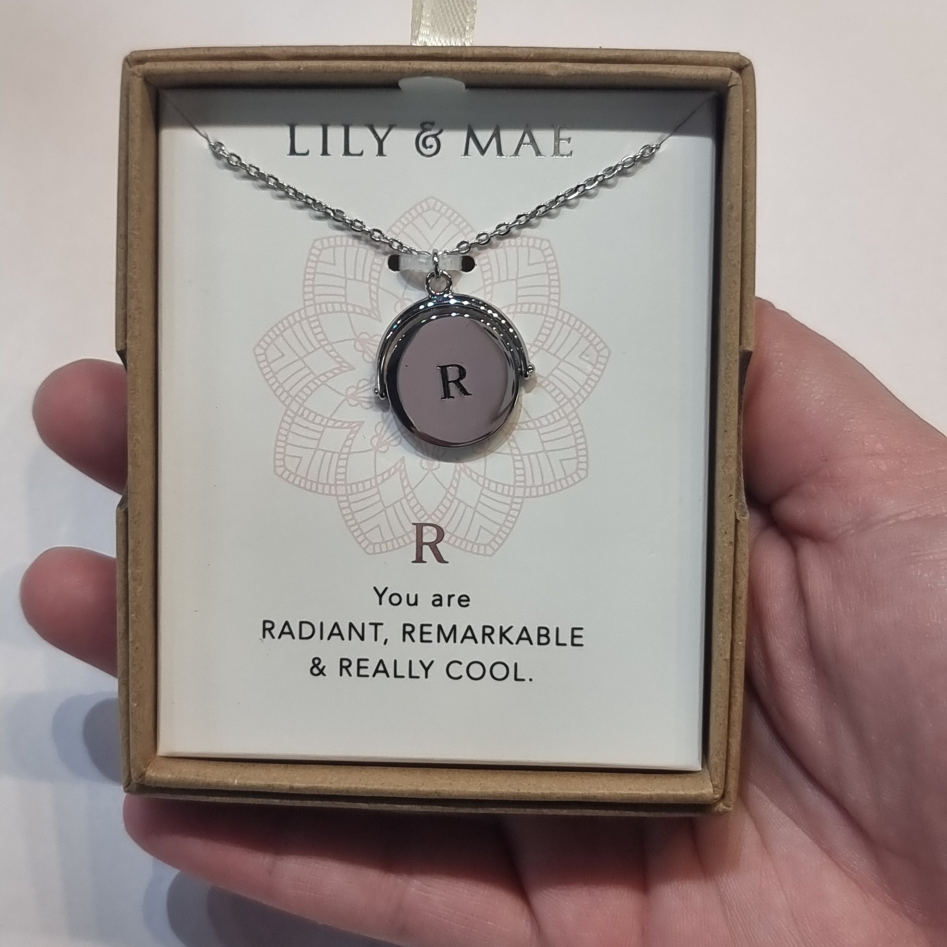 L&M spinning necklace - R - Rivendell Shop