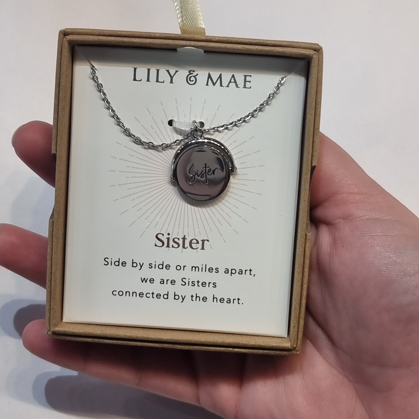 L&M spinning necklace - Sister - Rivendell Shop