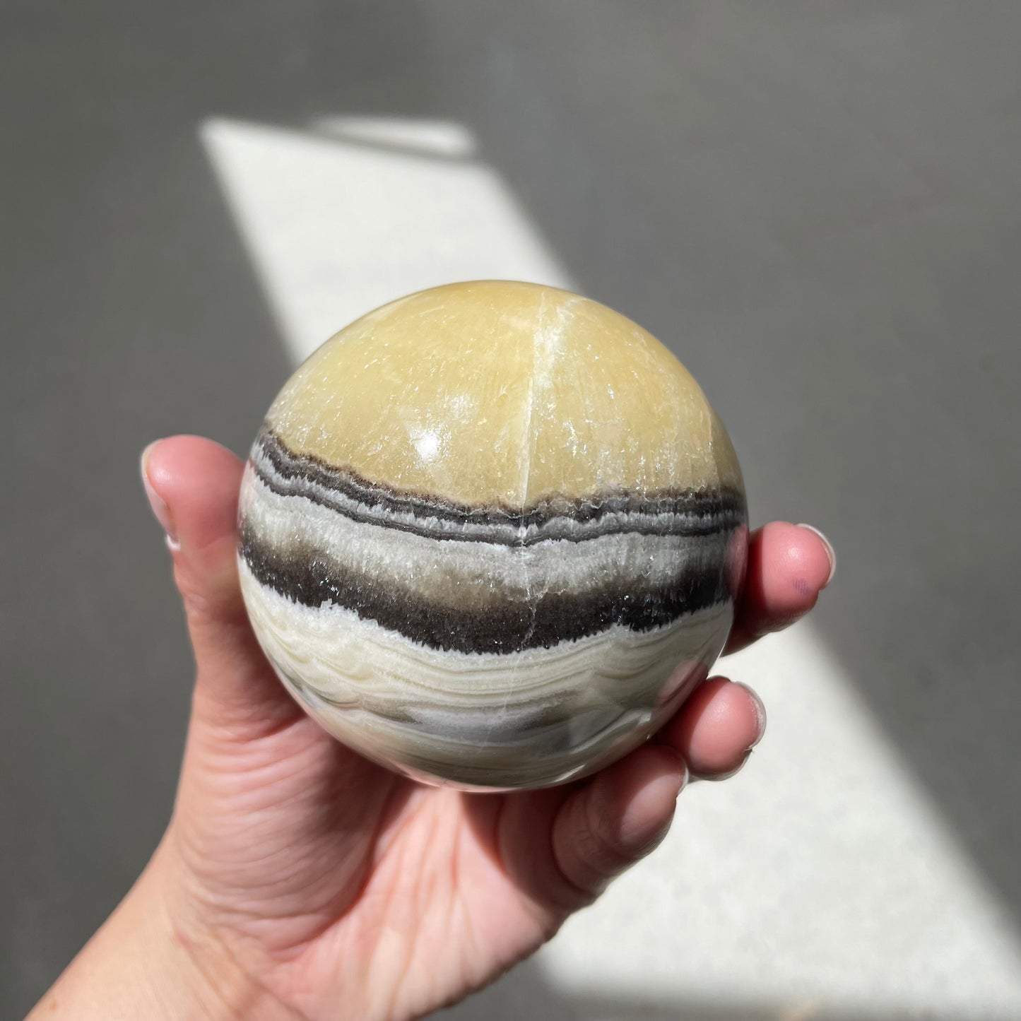 Zebra calcite sphere - Rivendell Shop