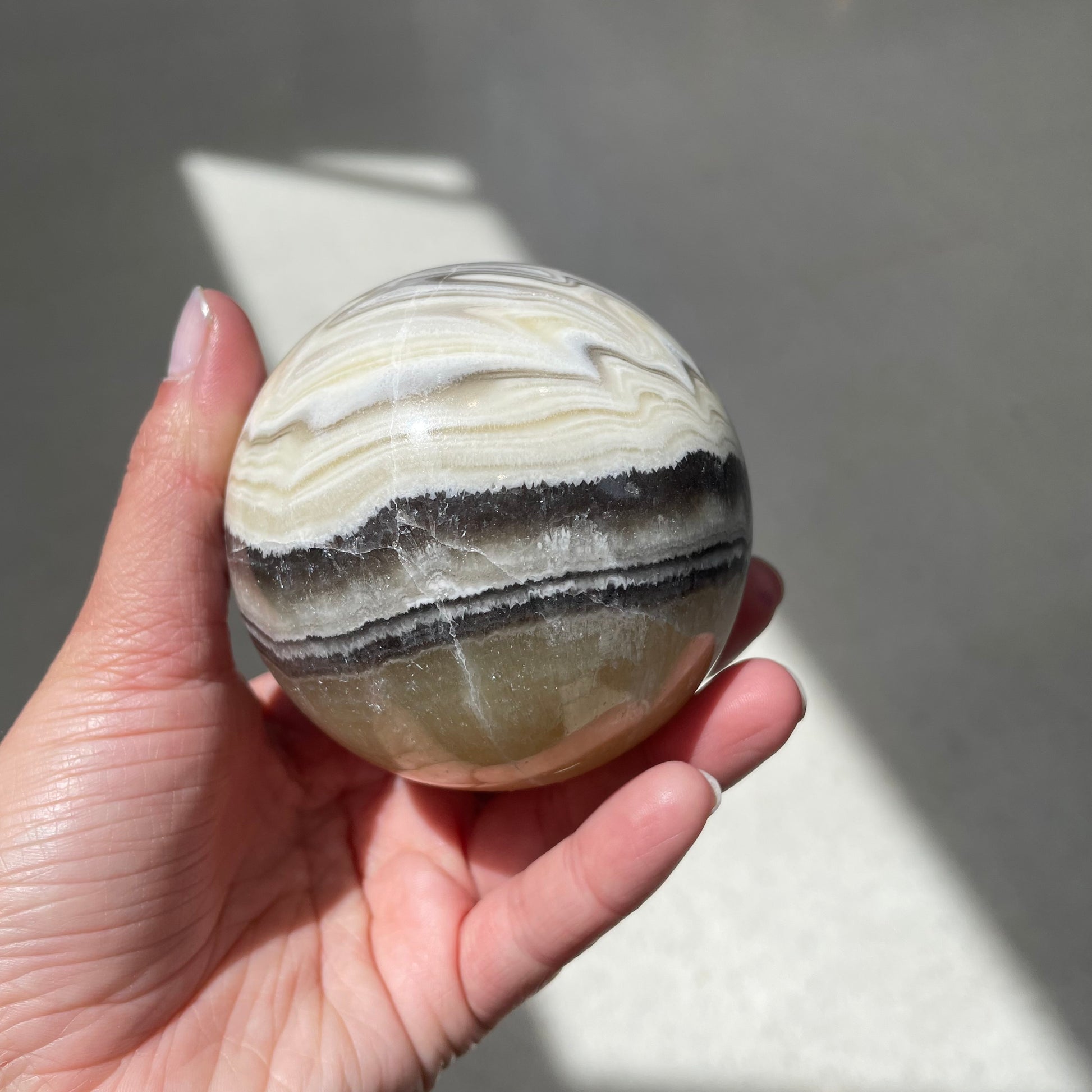 Zebra calcite sphere - Rivendell Shop